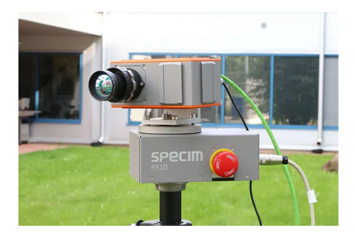 FX camera mounted on top of RS10 rotary stage scanner on tripod imaging outdoor scene