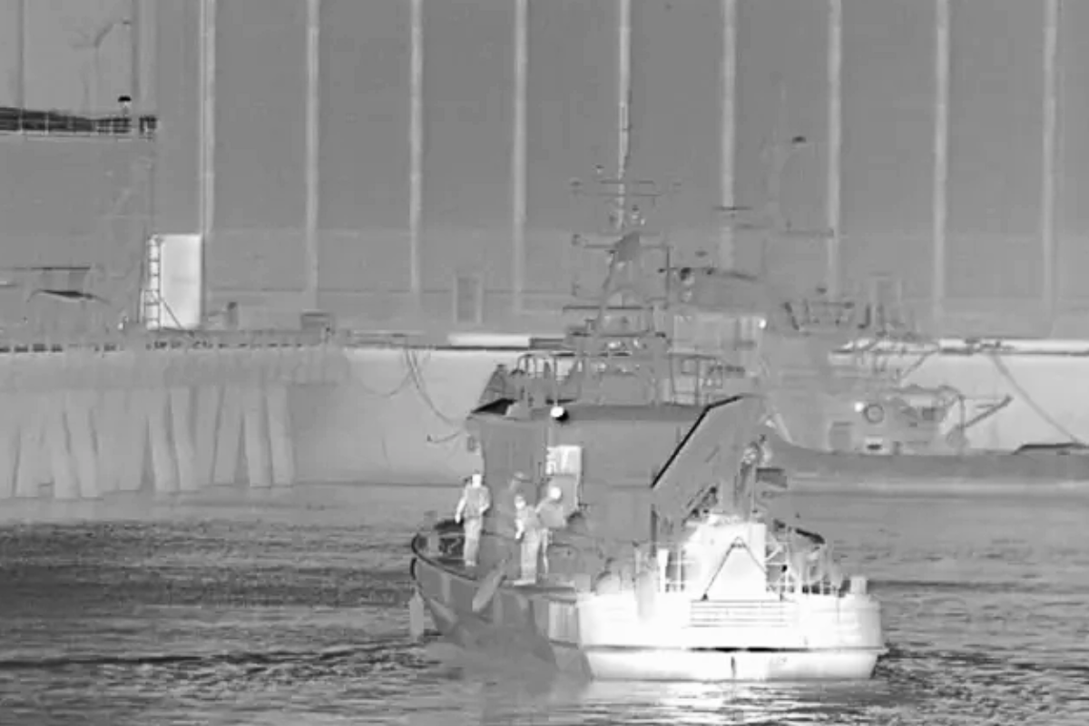 Longwave image of boat with people on board