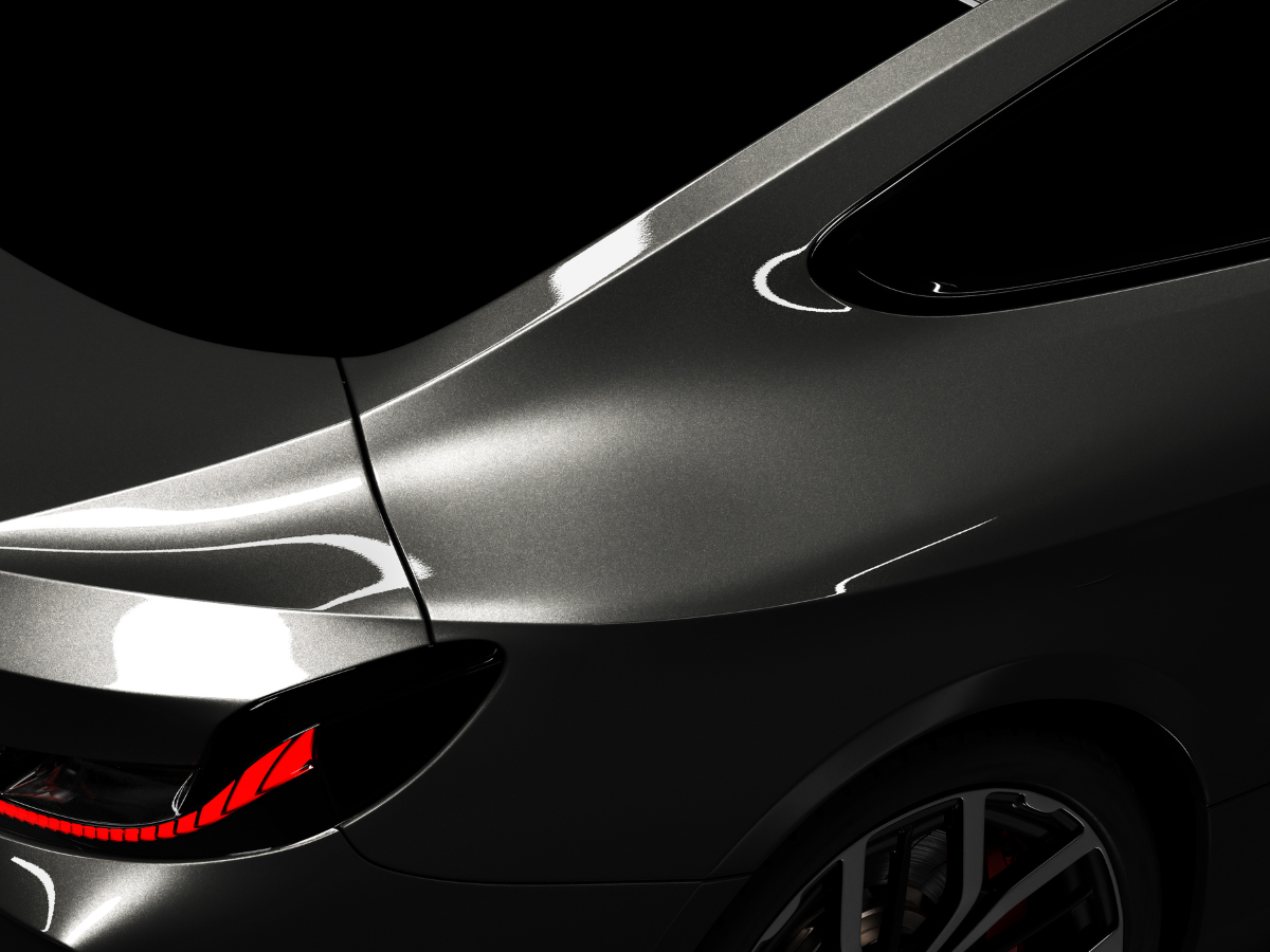 Close-up on the side of a car showing paint and finish