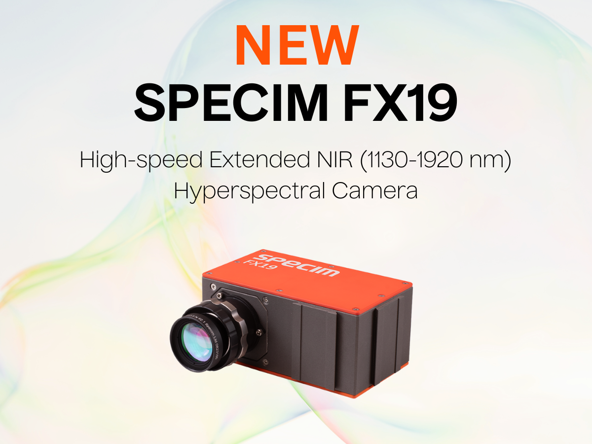 New Specim FX19 High Speed Extended NIR (1130-1920 nm) Hyperspectral Camera with image of FX19 with mounted objective lens