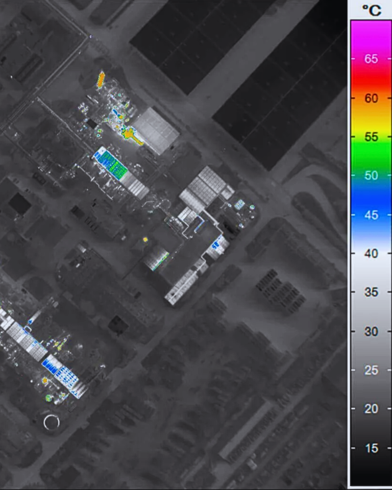 Airborne thermal image of buildings with temperature scale